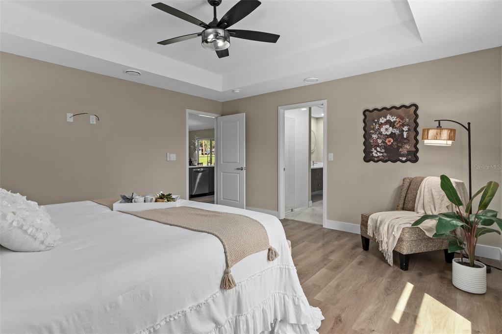 3011 East Griffin Street Inverness, FL 34453 - Photo 26 of 45 a bedroom with a two bed and a potted plant