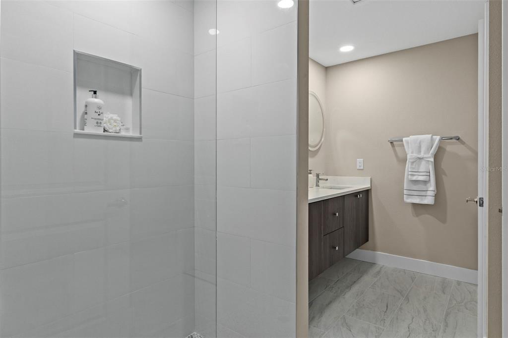 3011 East Griffin Street Inverness, FL 34453 - Photo 27 of 45 a bathroom with a sink and a mirror