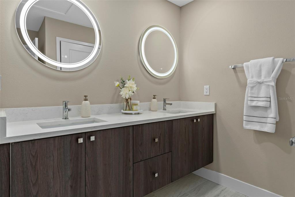 3011 East Griffin Street Inverness, FL 34453 - Photo 28 of 45 a bathroom with a sink and a mirror