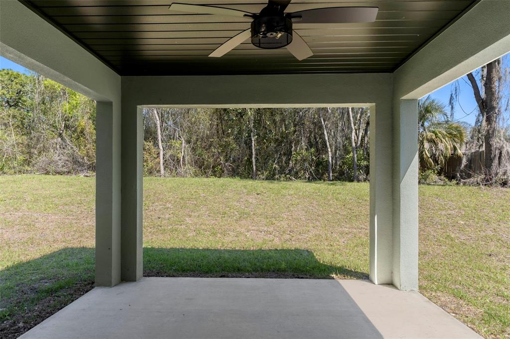 3011 East Griffin Street Inverness, FL 34453 - Photo 40 of 45 a view of a porch with a yard