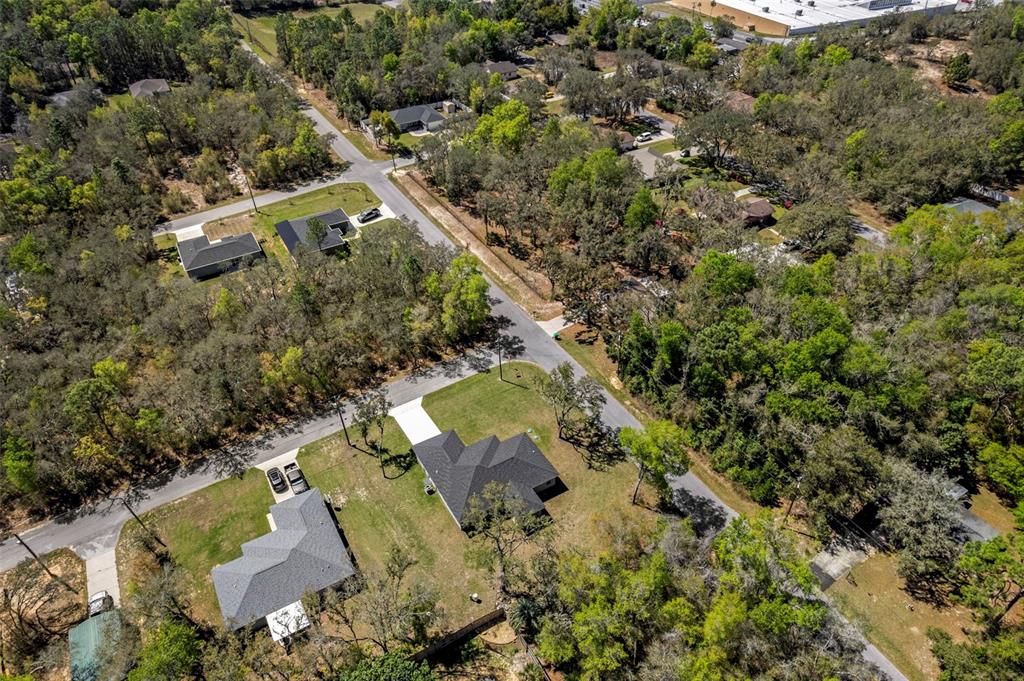 3011 East Griffin Street Inverness, FL 34453 - Photo 44 of 45 an aerial view of residential houses with outdoor space