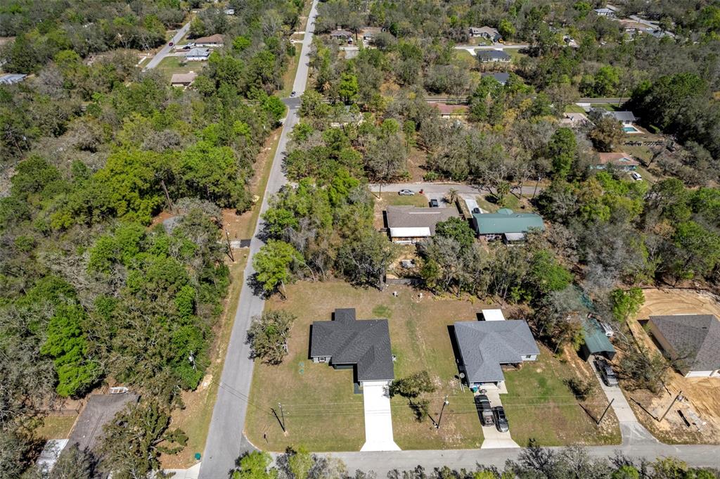 3011 East Griffin Street Inverness, FL 34453 - Photo 7 of 45 an aerial view of residential houses with outdoor space