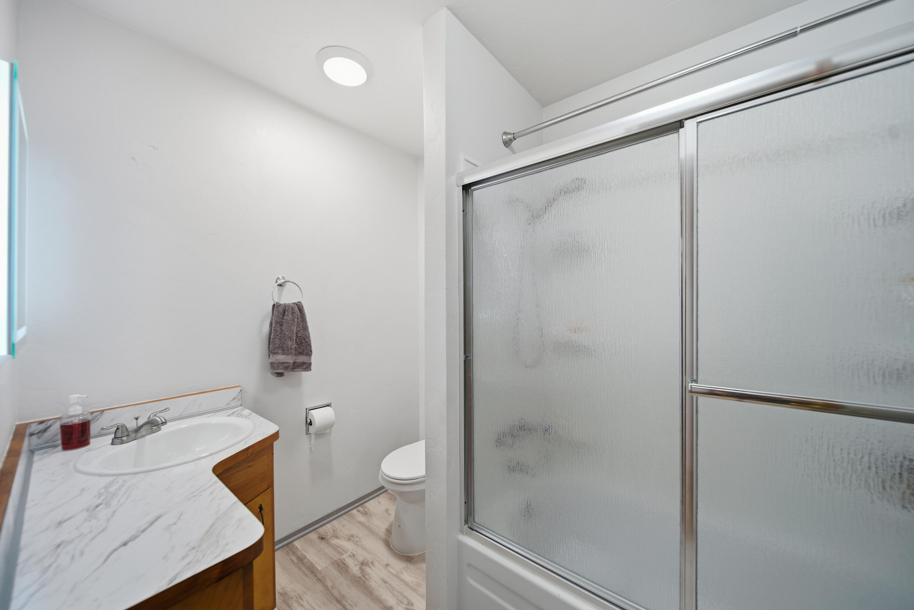 9807 Logan Road Palo Cedro, CA 96073 - Photo 19 of 53 a bathroom with a sink and a toilet