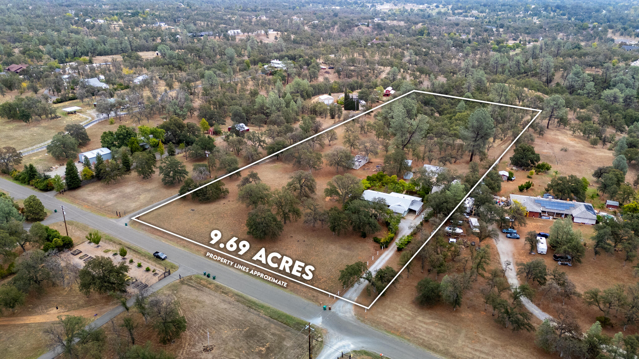 9807 Logan Road Palo Cedro, CA 96073 - Photo 3 of 53 a view of a city street from a balcony