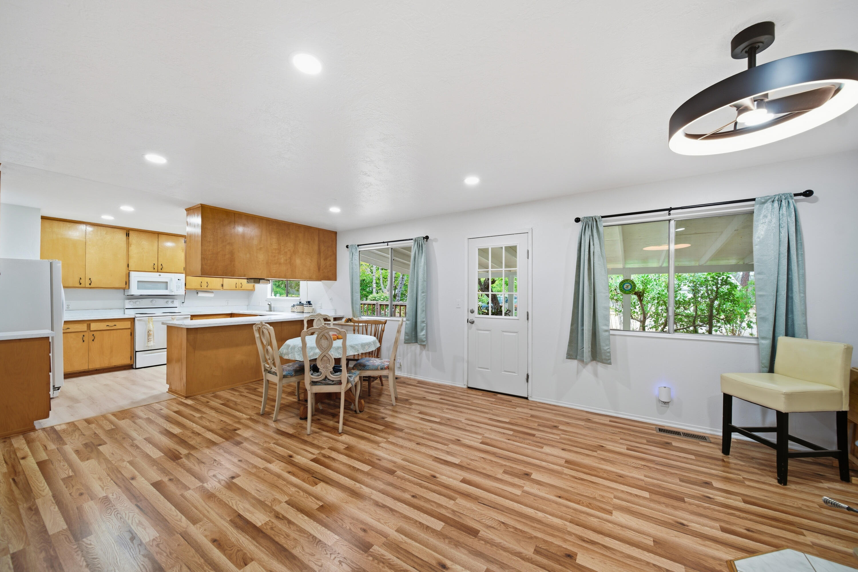 9807 Logan Road Palo Cedro, CA 96073 - Photo 7 of 53 a living room with furniture and a wooden floor