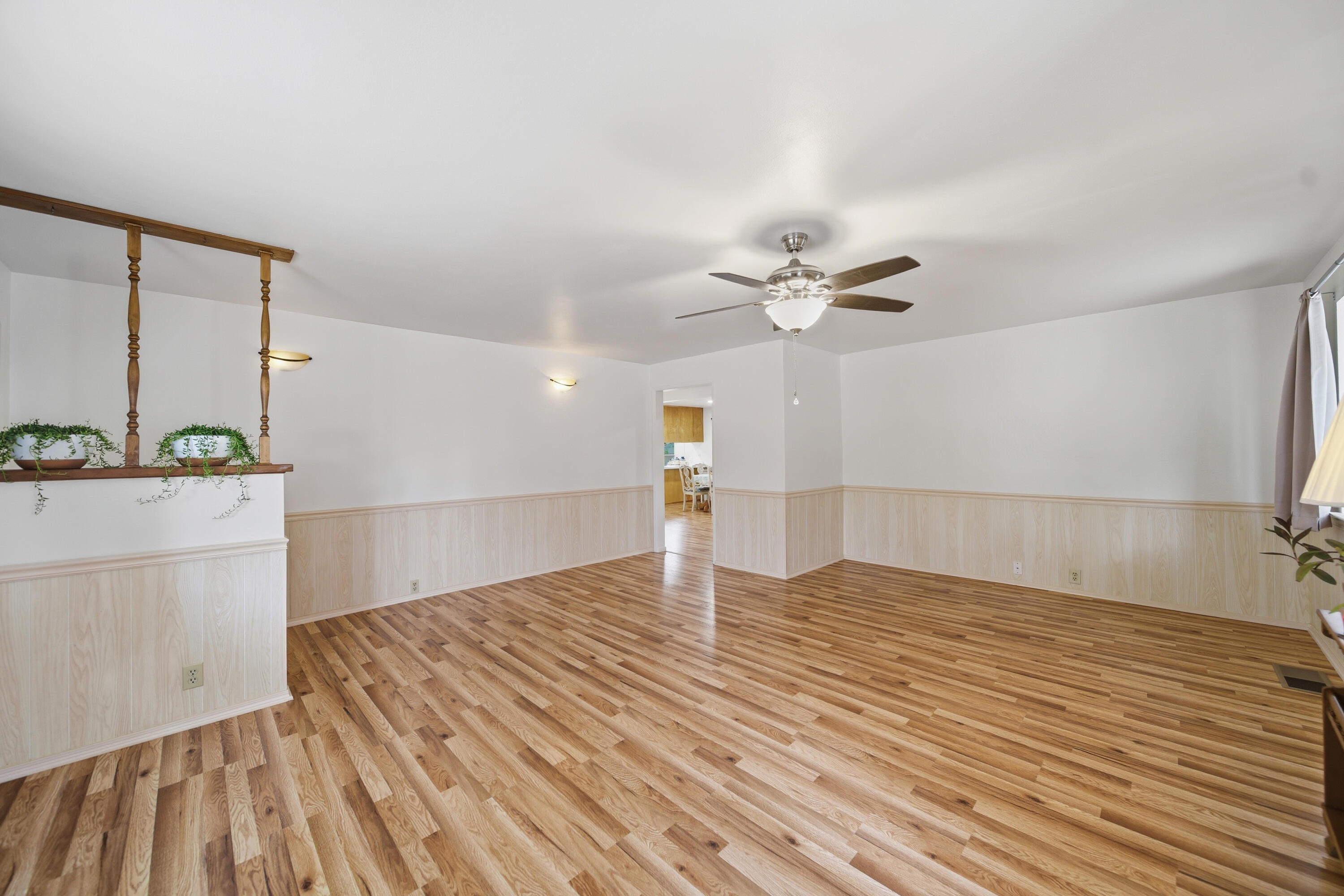9807 Logan Road Palo Cedro, CA 96073 - Photo 8 of 53 a view of a kitchen with a sink and wooden floor