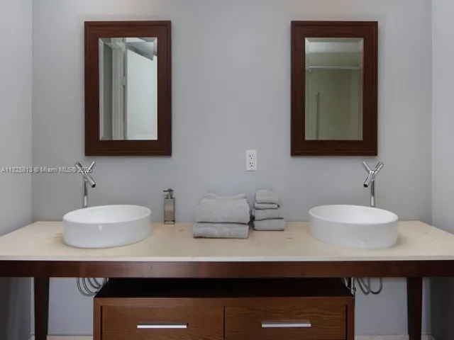 a bathroom with a shower and a toilet