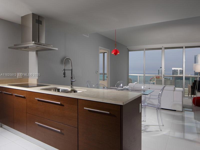 495 Brickell Avenue, Unit 4205 Miami, FL 33131 - Photo 7 of 21 a kitchen with a sink and a window