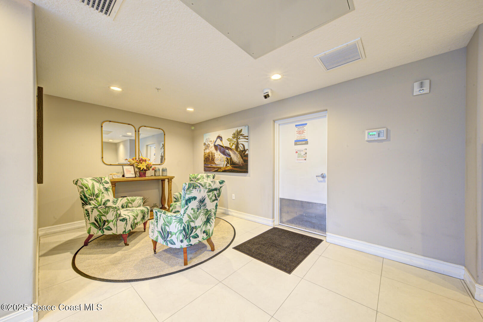 1805 Riverside Drive, Unit 504 Titusville, FL 32780 - Photo 4 of 48 River Palms building 1805 lobby
