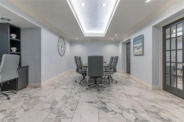 a view of a hallway with a chandelier