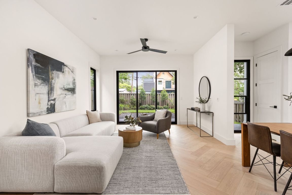 2707 Stacy Lane, Unit 1 Austin, TX 78704 - Photo 14 of 40 a living room with furniture and a large window