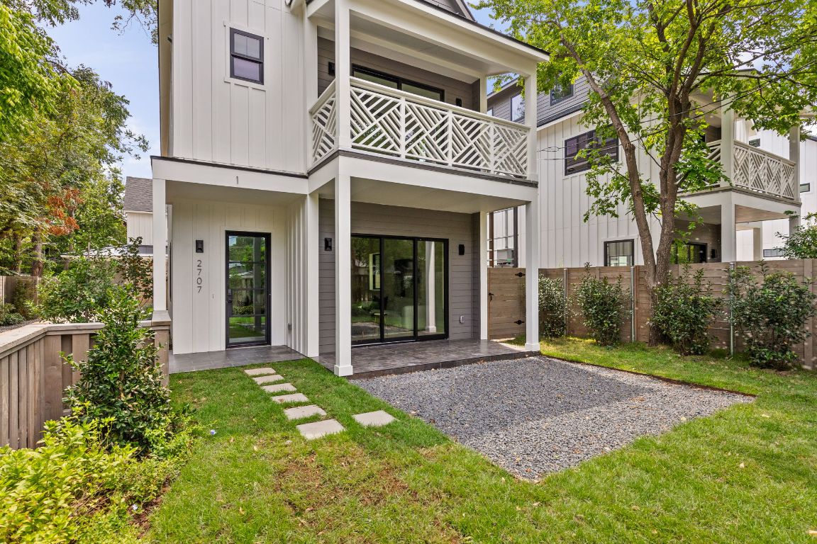 2707 Stacy Lane, Unit 1 Austin, TX 78704 - Photo 15 of 40 front view of a house with a yard