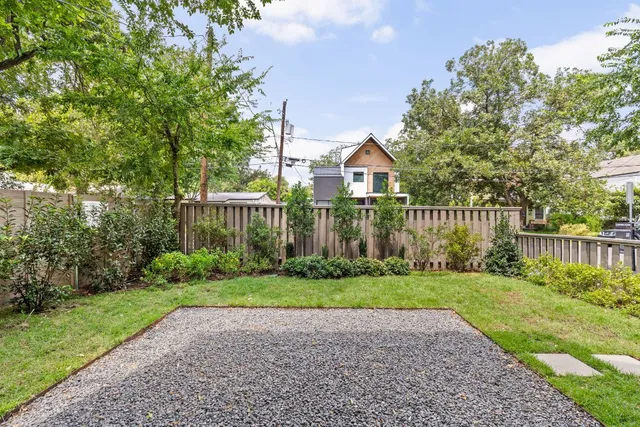 a kitchen with stainless steel appliances granite countertop a sink and stove