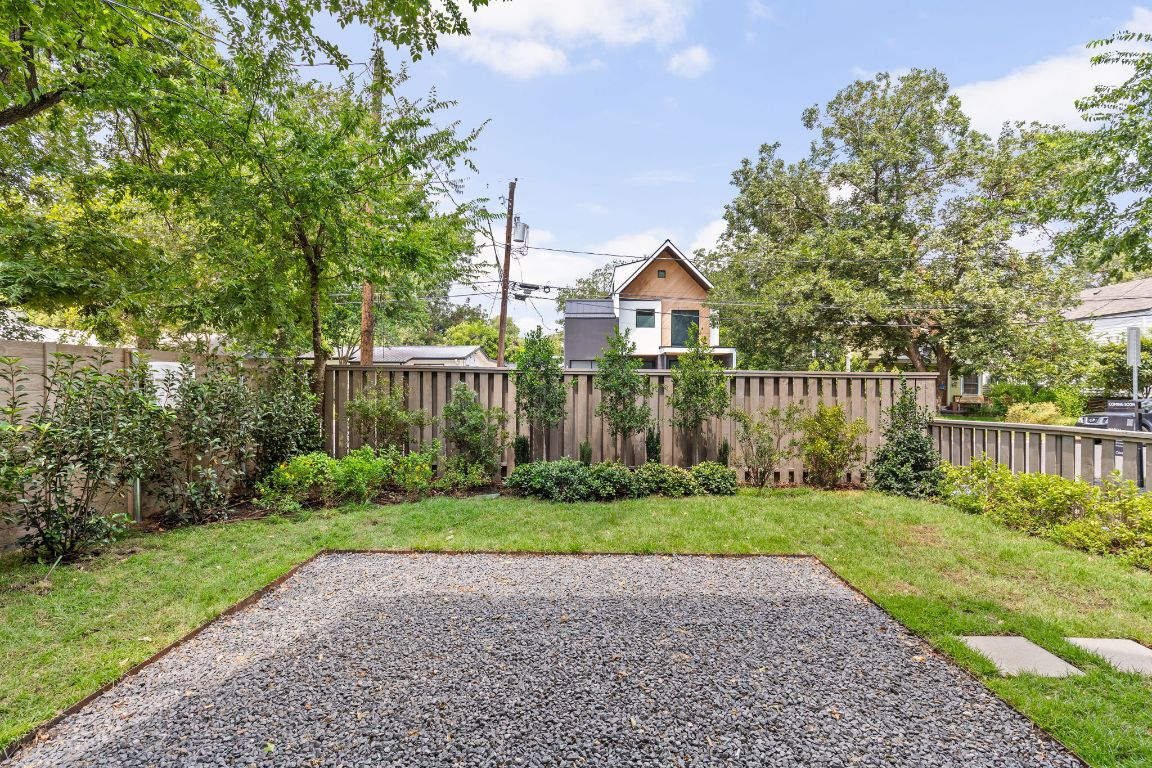 2707 Stacy Lane, Unit 1 Austin, TX 78704 - Photo 16 of 40 a view of a house with a yard and potted plants