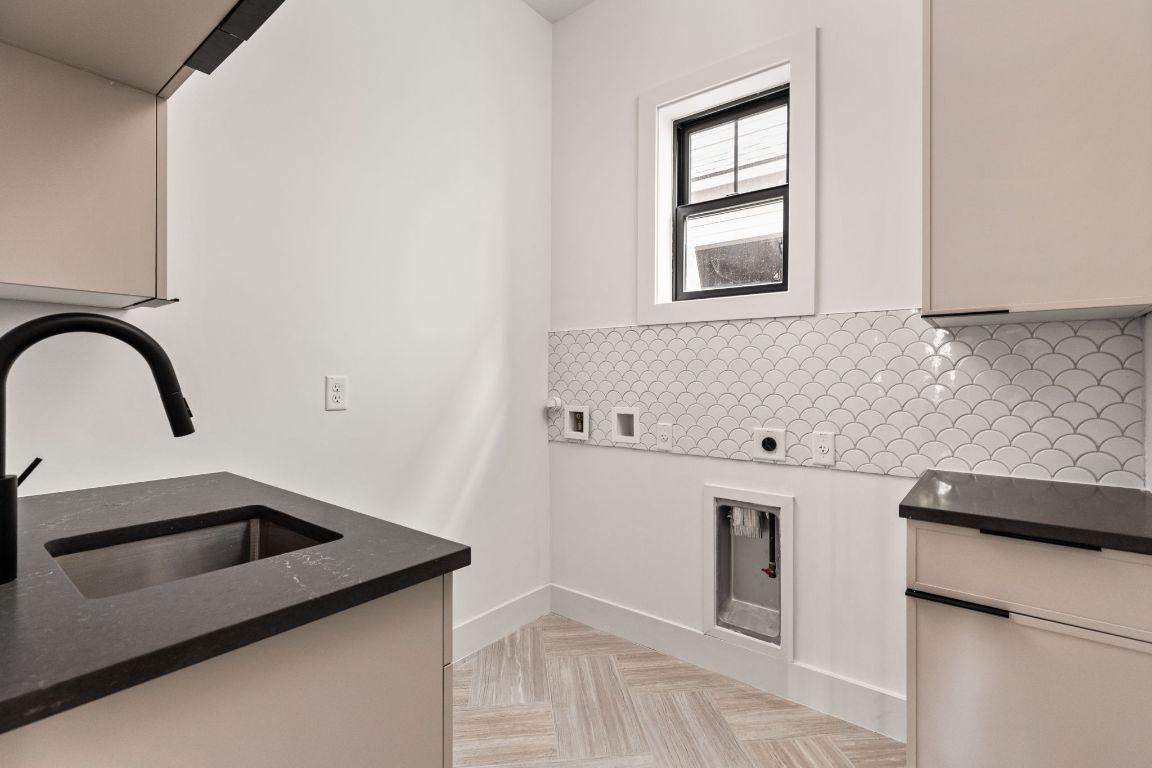2707 Stacy Lane, Unit 1 Austin, TX 78704 - Photo 19 of 40 a close view of a sink and a kitchen counter space