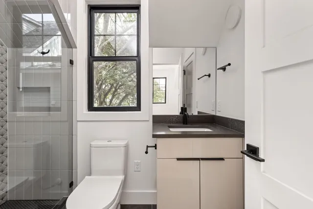 a view of an empty room with a window