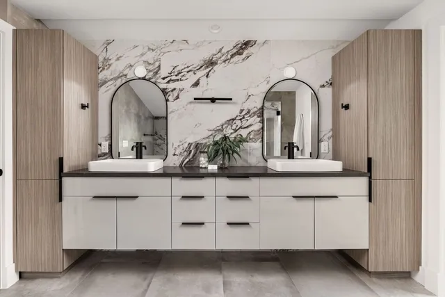 a white bath tub sitting in a bathroom