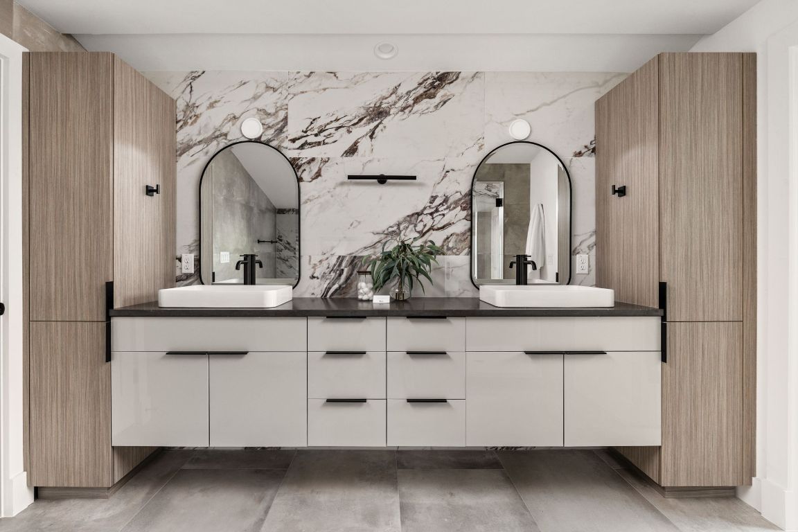 2707 Stacy Lane, Unit 1 Austin, TX 78704 - Photo 32 of 40 a bathroom with a double vanity sink and a mirror