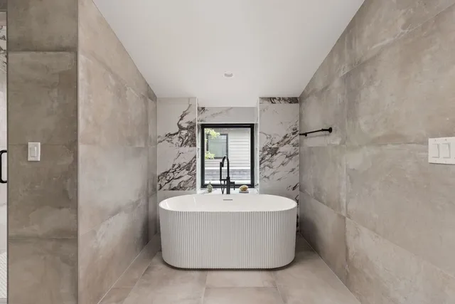 a view of a pathway with house on both side