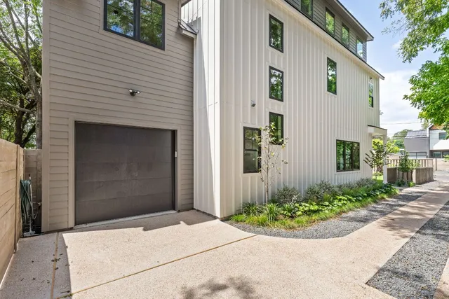 an aerial view of a city with lots of residential buildings