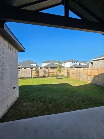 a view of outdoor space and yard