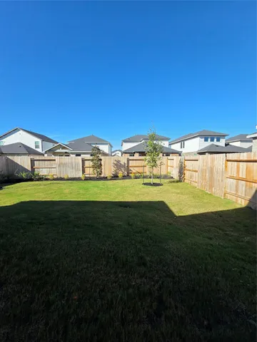 a view of a house with a big yard
