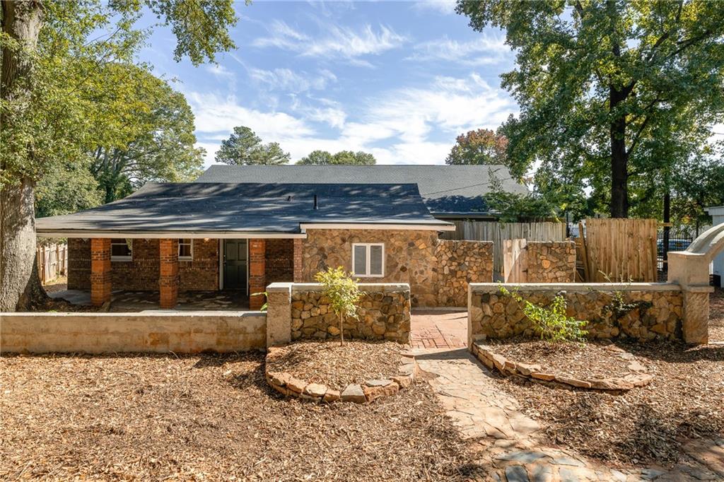 1612 Elleby Road Southeast Atlanta, GA 30315 - Photo 1 of 1 a view of a house with backyard