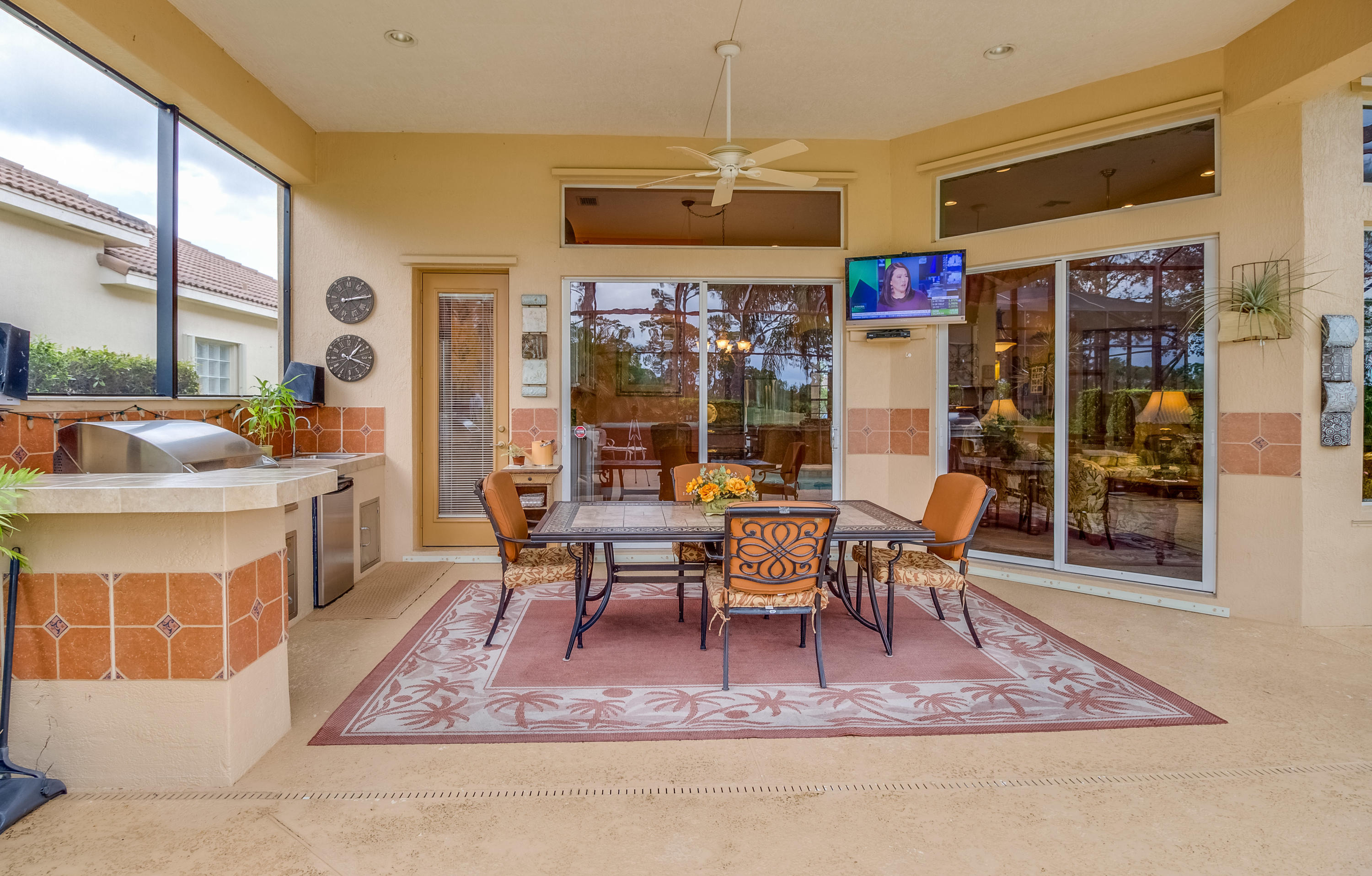 8617 Tompson Point Road Port St. Lucie, FL 34986 - Photo 34 of 38 a view of a dining room with furniture window and outside view