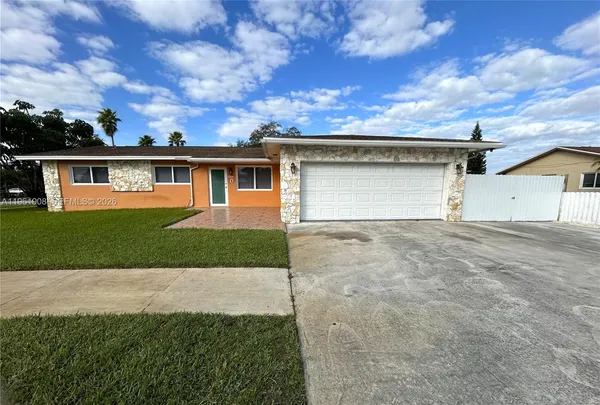 front view of house with a yard