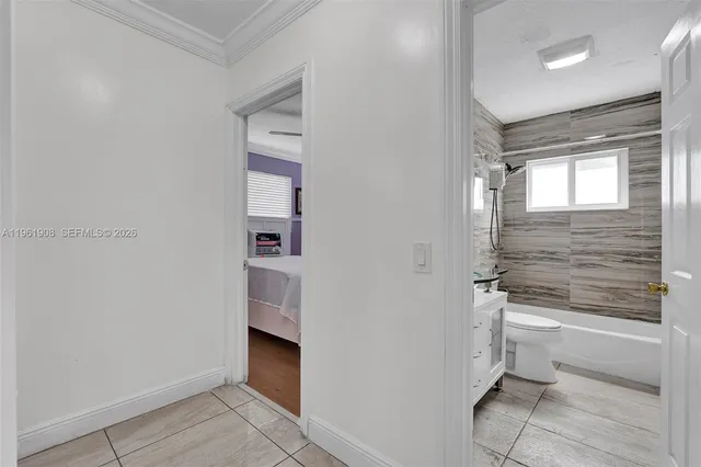 a bathroom with a bathtub and a sink