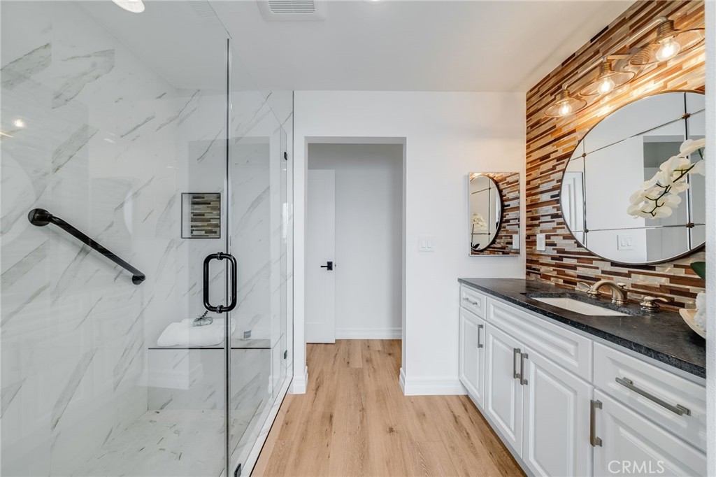 26822 Calle Real Dana Point, CA 92624 - Photo 20 of 41 a kitchen with a sink and a stove