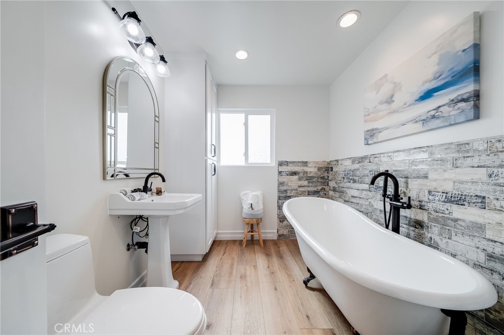 26822 Calle Real Dana Point, CA 92624 - Photo 21 of 41 a bathroom with a toilet sink and mirror