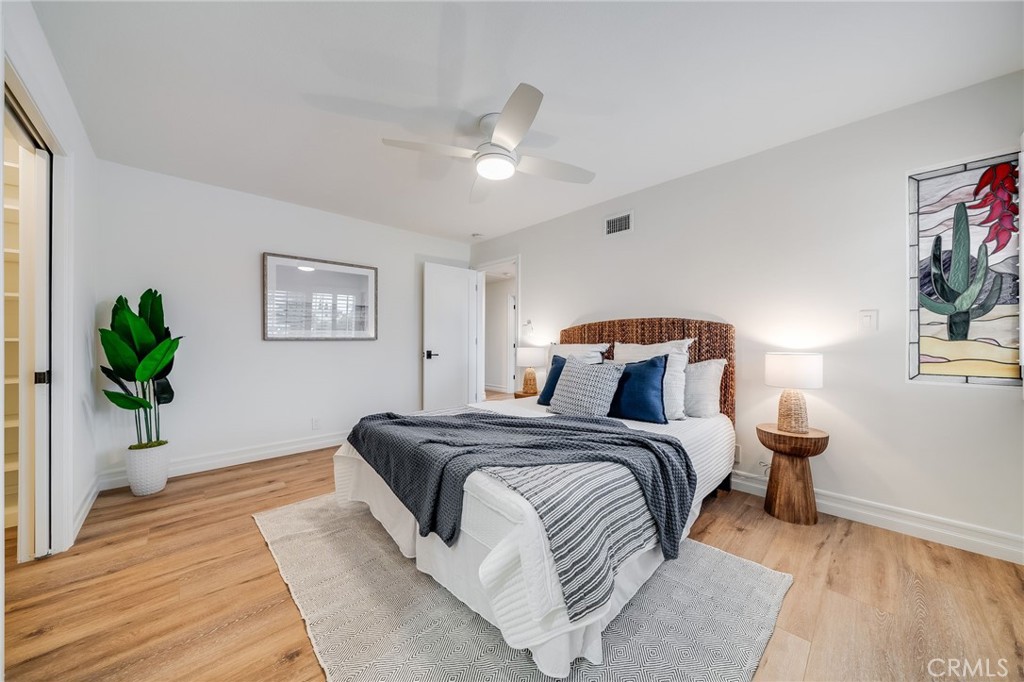 26822 Calle Real Dana Point, CA 92624 - Photo 23 of 41 a bedroom with a bed and a potted plant