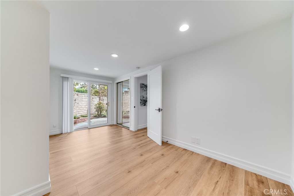 26822 Calle Real Dana Point, CA 92624 - Photo 28 of 41 a view of an empty room with wooden floor and a window