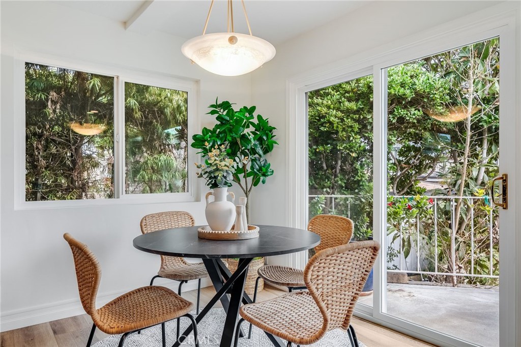 26822 Calle Real Dana Point, CA 92624 - Photo 10 of 41 a dining room with furniture and a large window