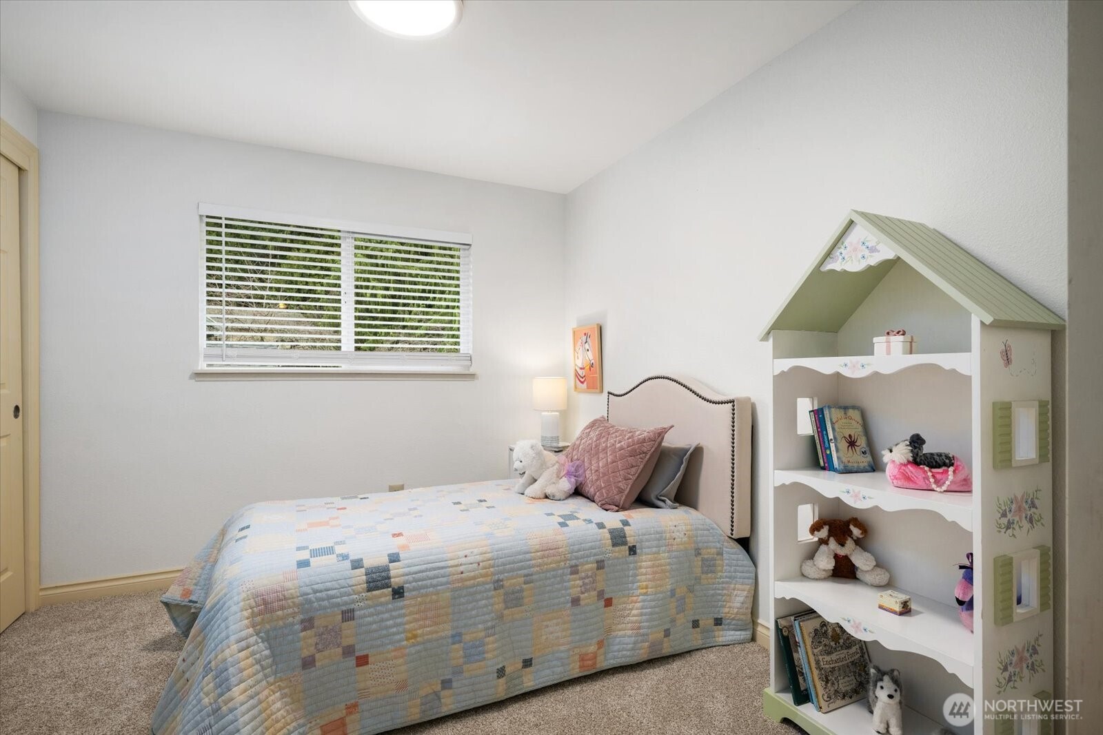 20702 11th Drive Southeast Bothell, WA 98012 - Photo 20 of 38 a bedroom with a bed and a dresser