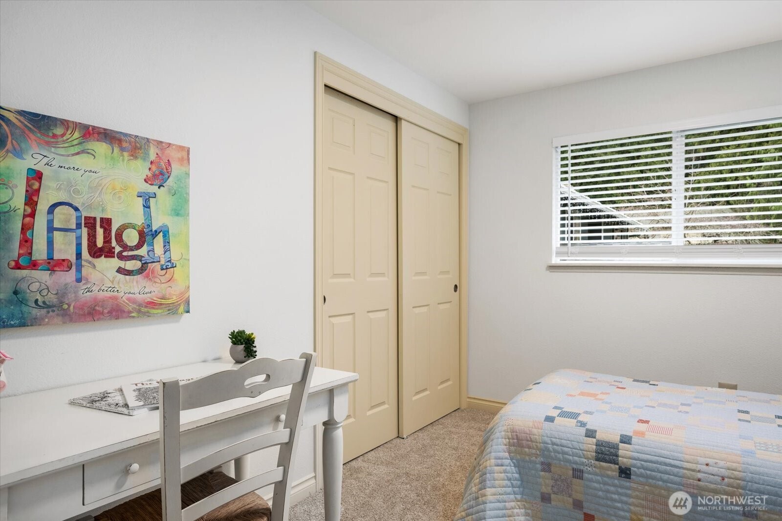 20702 11th Drive Southeast Bothell, WA 98012 - Photo 21 of 38 a bedroom with a bed and furniture