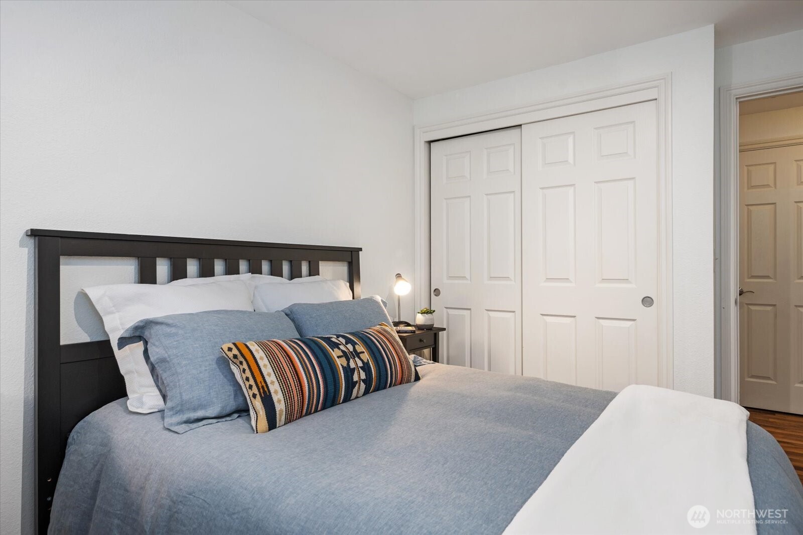 20702 11th Drive Southeast Bothell, WA 98012 - Photo 23 of 38 a bedroom with a bed and closet