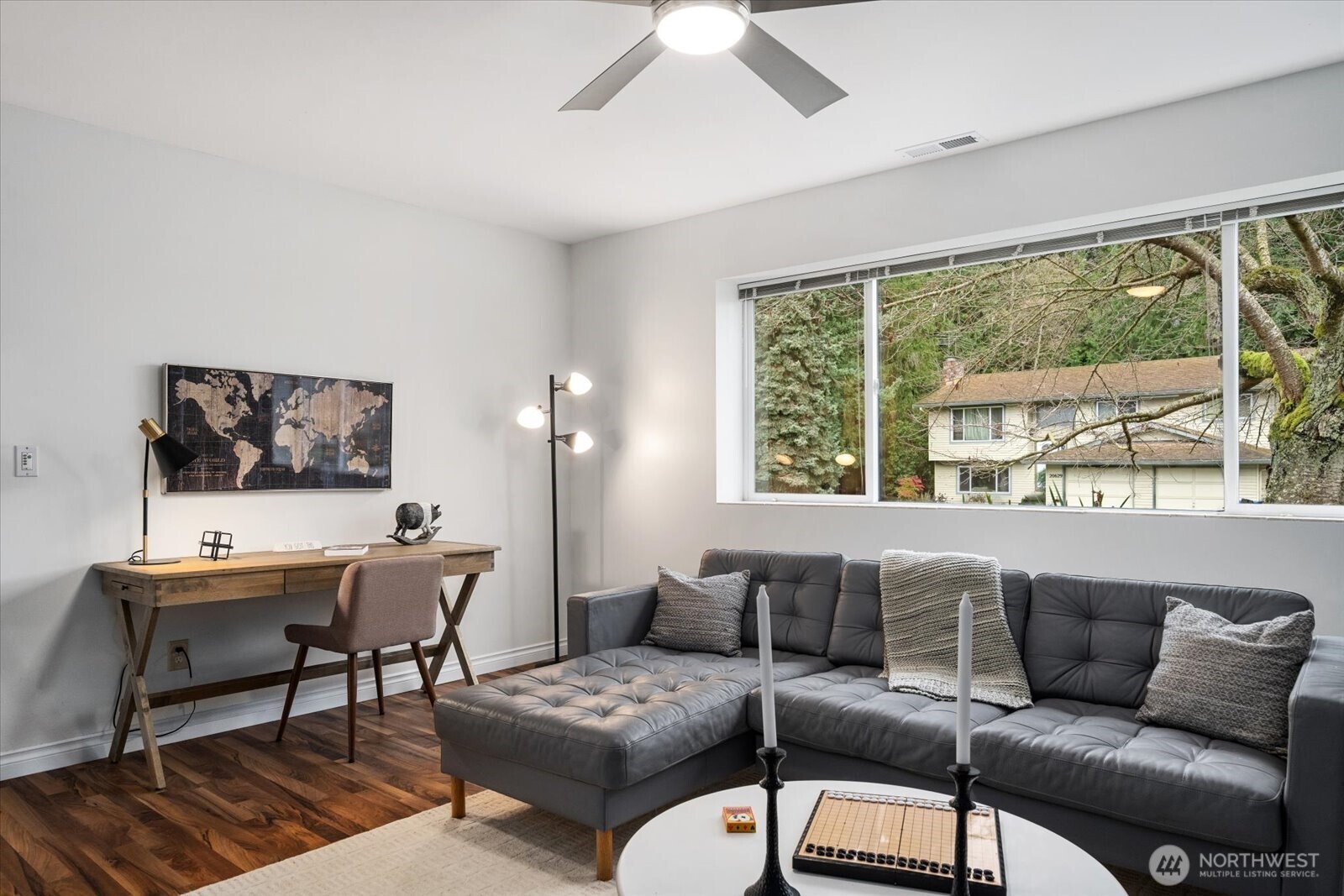 20702 11th Drive Southeast Bothell, WA 98012 - Photo 26 of 38 a living room with furniture and a large window
