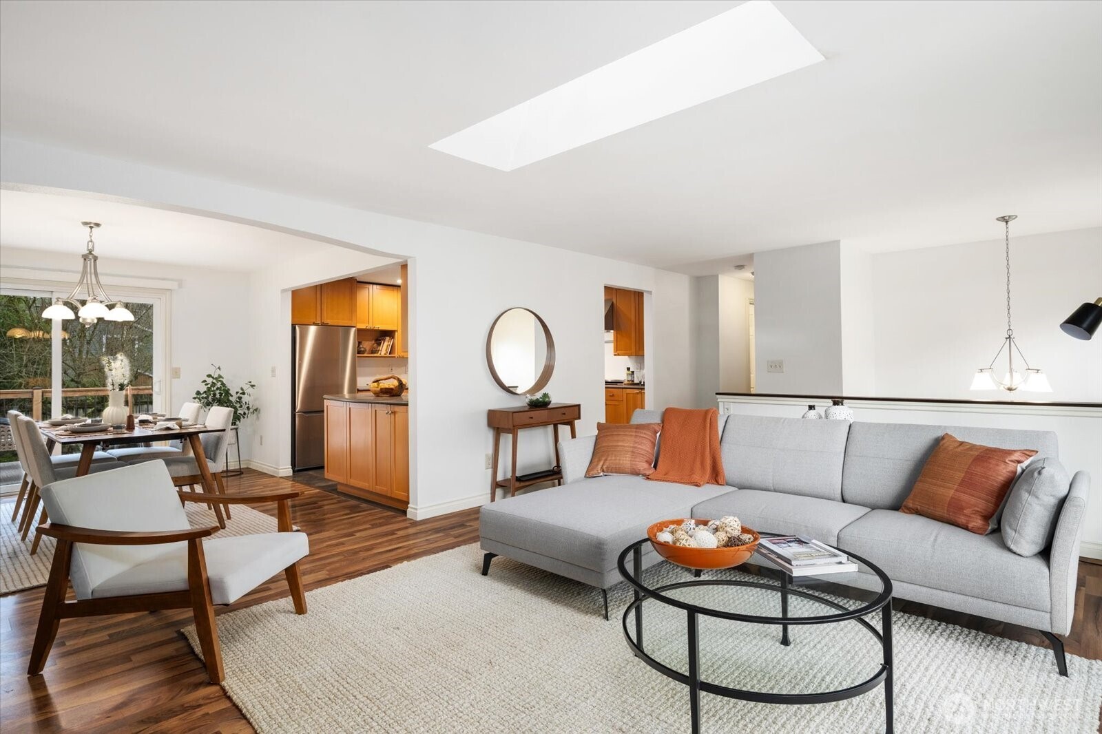 20702 11th Drive Southeast Bothell, WA 98012 - Photo 8 of 38 a living room with furniture and kitchen view
