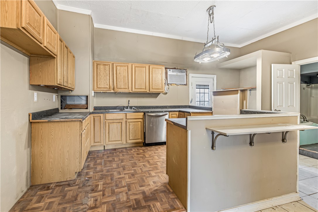 124 12th Street Somerville, TX 77879 - Photo 14 of 42 a kitchen with cabinets a sink and appliances