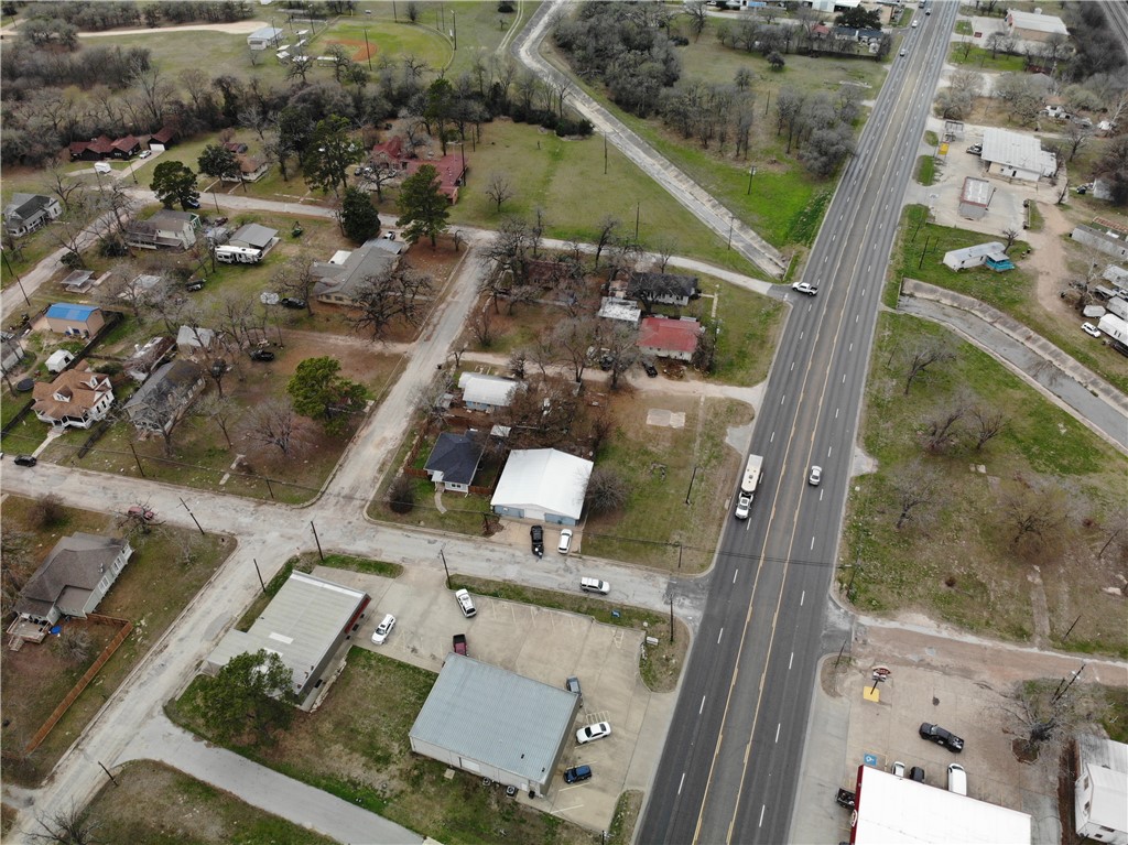124 12th Street Somerville, TX 77879 - Photo 34 of 42 an aerial view of houses with outdoor space