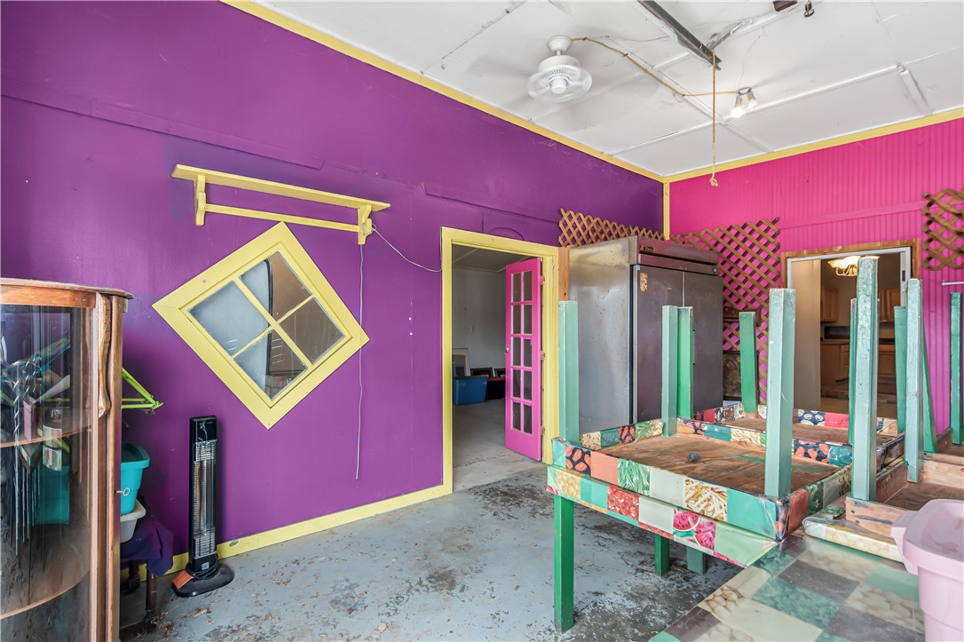 124 12th Street Somerville, TX 77879 - Photo 8 of 42 a bed sitting in a room next to a building