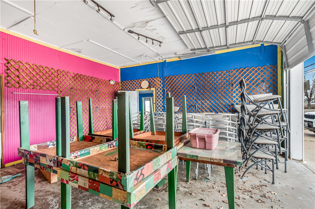 124 12th Street Somerville, TX 77879 - Photo 10 of 42 a view of a chairs and table in the patio