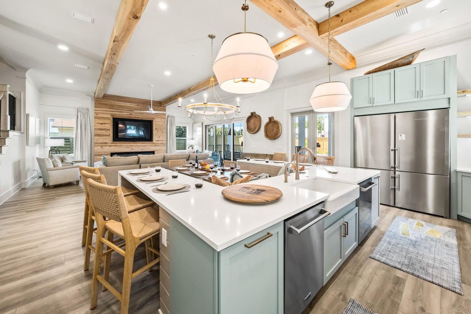21524 Front Beach Road Panama City Beach, FL 32413 - Photo 16 of 73 a kitchen with a sink and a refrigerator