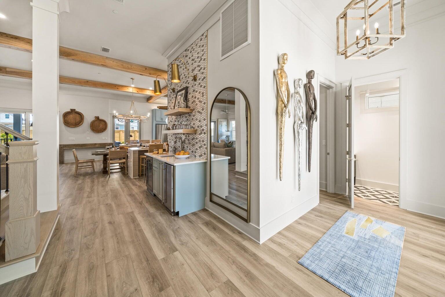 21524 Front Beach Road Panama City Beach, FL 32413 - Photo 21 of 73 a kitchen with stainless steel appliances granite countertop a refrigerator a stove and a wooden floors