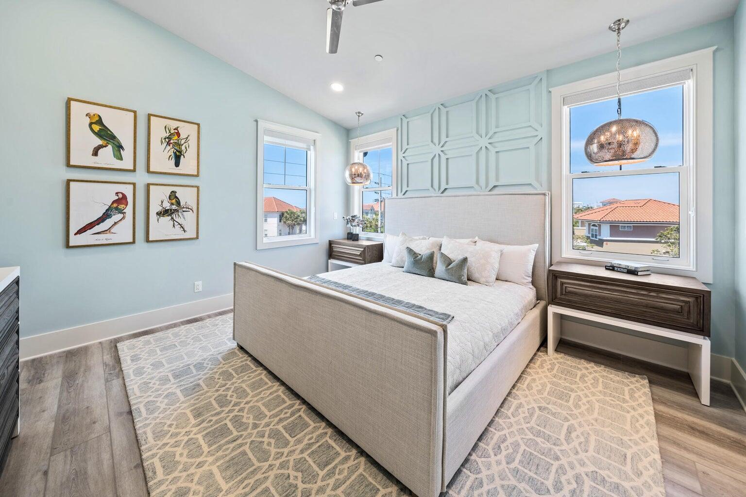 21524 Front Beach Road Panama City Beach, FL 32413 - Photo 31 of 73 a room with a bed and a painting on the wall