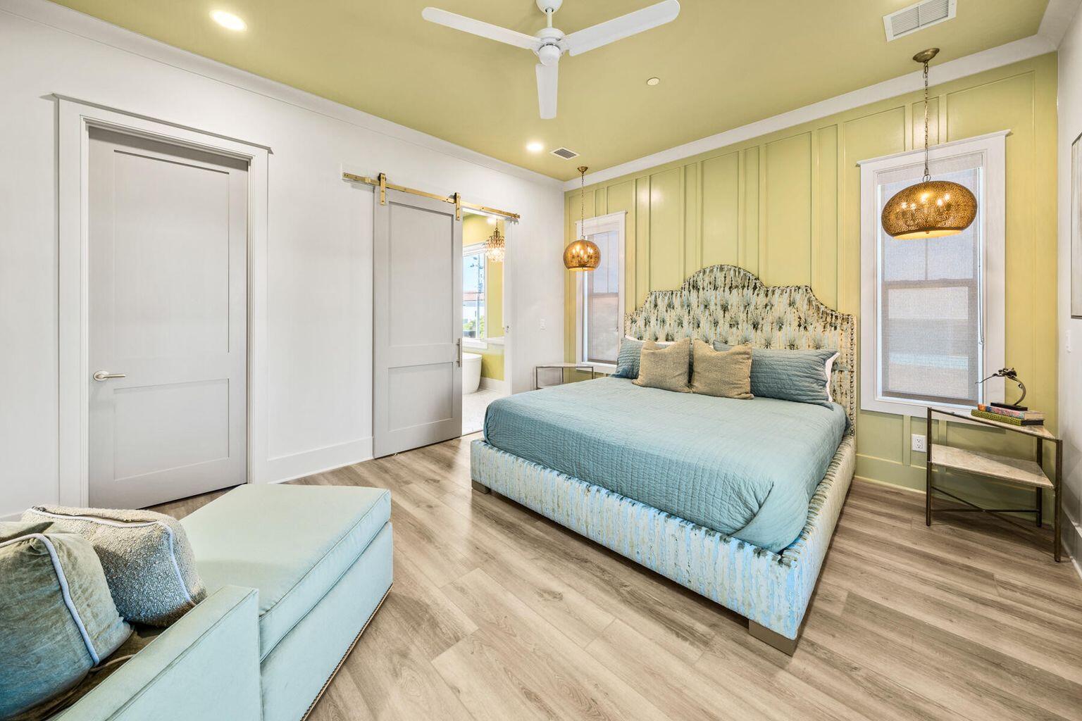 21524 Front Beach Road Panama City Beach, FL 32413 - Photo 46 of 73 a spacious bedroom with a bed and furniture