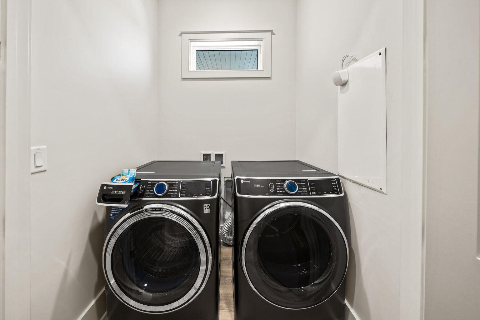 21524 Front Beach Road Panama City Beach, FL 32413 - Photo 55 of 73 a utility room with dryer and washer