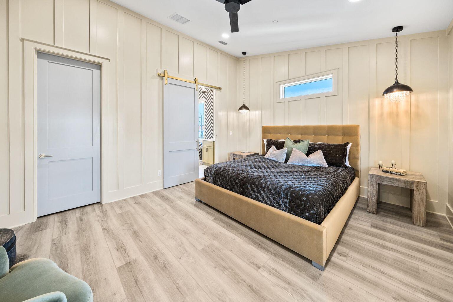 21524 Front Beach Road Panama City Beach, FL 32413 - Photo 58 of 73 a bedroom with a bed and a dresser